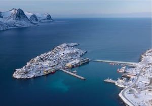 Aerial view of harbor and fishing village in Senja, Norway.